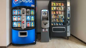 A vending machine area with a Pepsi machine and an ATM. - 2 Queen Beds|Hearing Accessible,Kitchen (Corpus Christi TX)