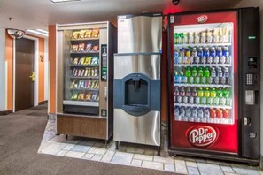 Vending machines with snacks and beverages, including Dr. Pepper.