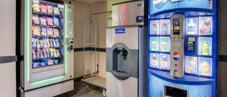A vending machine area with a Pepsi machine and a snack vending machine.