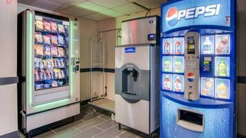 A vending machine area with a Pepsi machine and a snack vending machine.