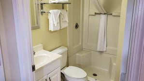 A bathroom with a toilet, sink, and shower. - 2 Full Beds | Non-Smoking (Richmond VA)