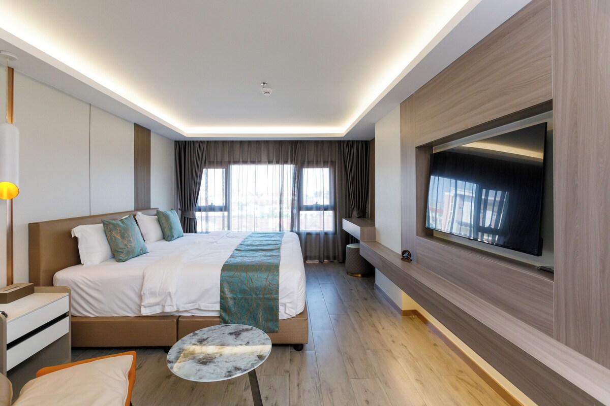 Desk, laptop workspace, blackout curtains, free WiFi