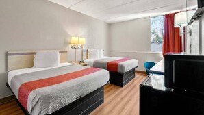 A hotel room with two beds, a desk, a chair, and a television. - 2 Queen Beds | Non-Smoking, Micfridge (Decatur GA)