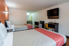A hotel room with two beds, a television, a desk with a chair, and a small kitchenette. - 2 FULL BEDS | NON-SMOKING, MICFRIDGE (Troutville)