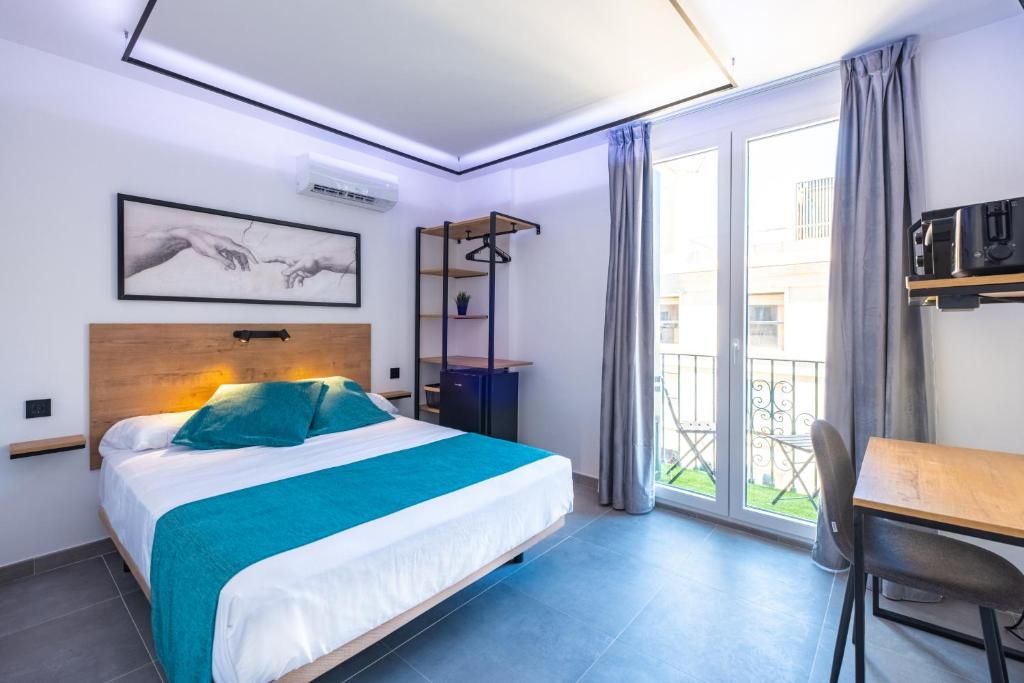 Deluxe tweepersoonskamer, balkon, uitzicht op de stad | Gratis wifi