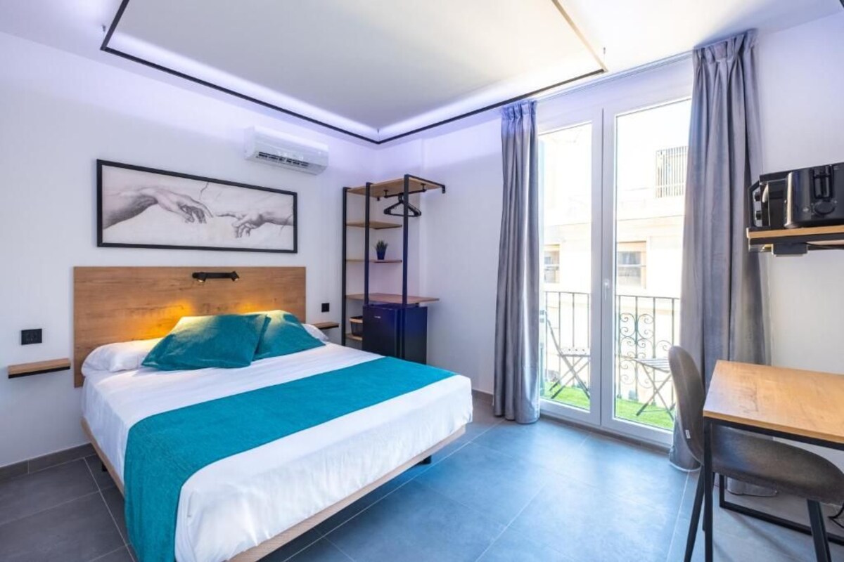 Kamar Double Deluks, balkon, pemandangan kota | Wi-Fi gratis