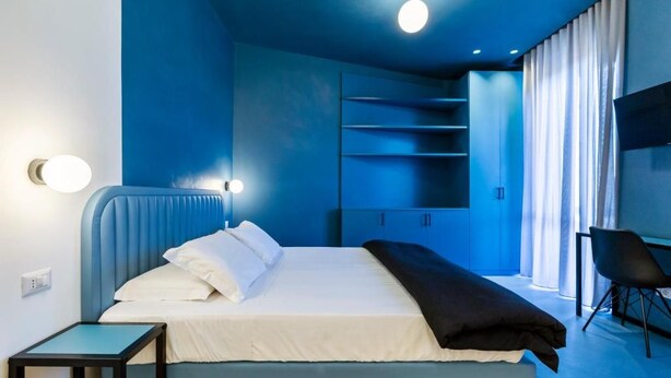 Quadruple Room, Balcony, Courtyard View | Kalis bunyi, Wi-fi percuma 