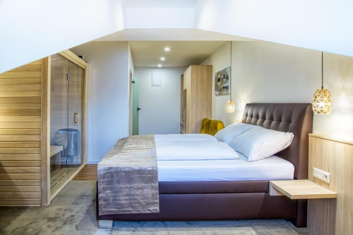 Quarto casal luxo, vista para a colina