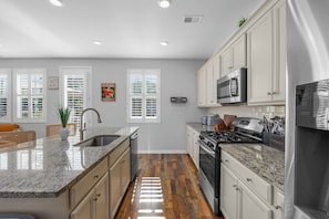Fully-equipped kitchen will all the essentials you will need for cooking and entertainment. - 3-Bedroom Home in the Heart of Myrtle Beach (Myrtle Beach)