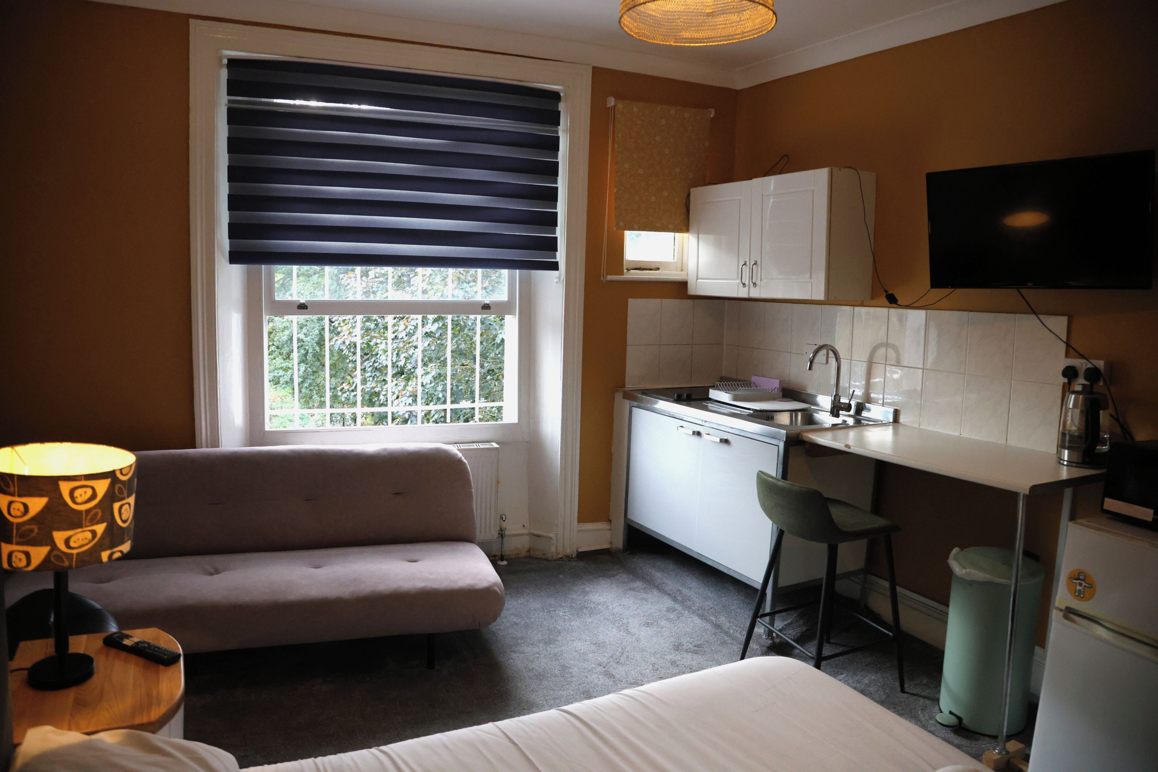 Standard Studio, Kitchen, Courtyard View | Iron/ironing board, free WiFi
