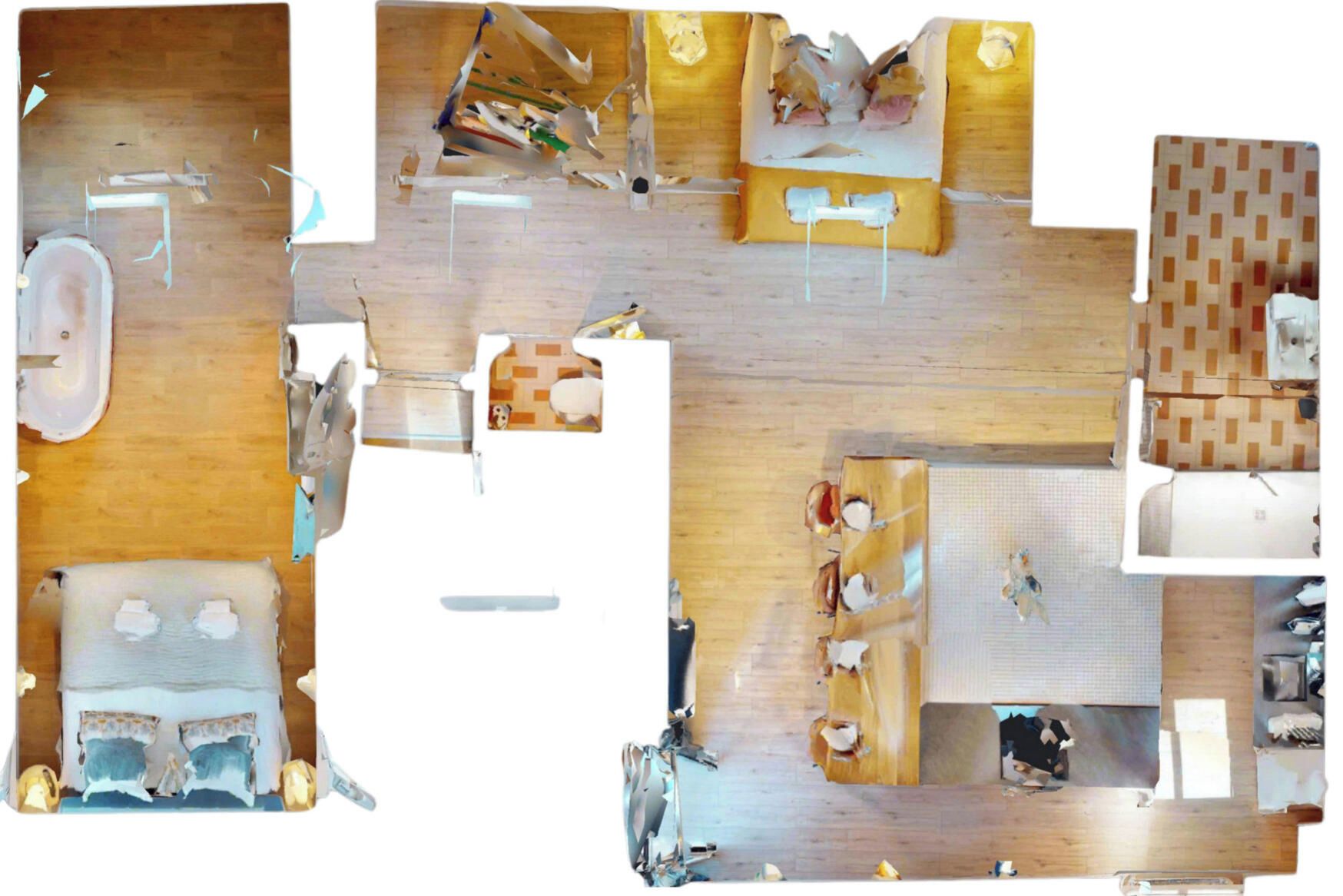 A room with a bed, a desk, a chair, and a small table.