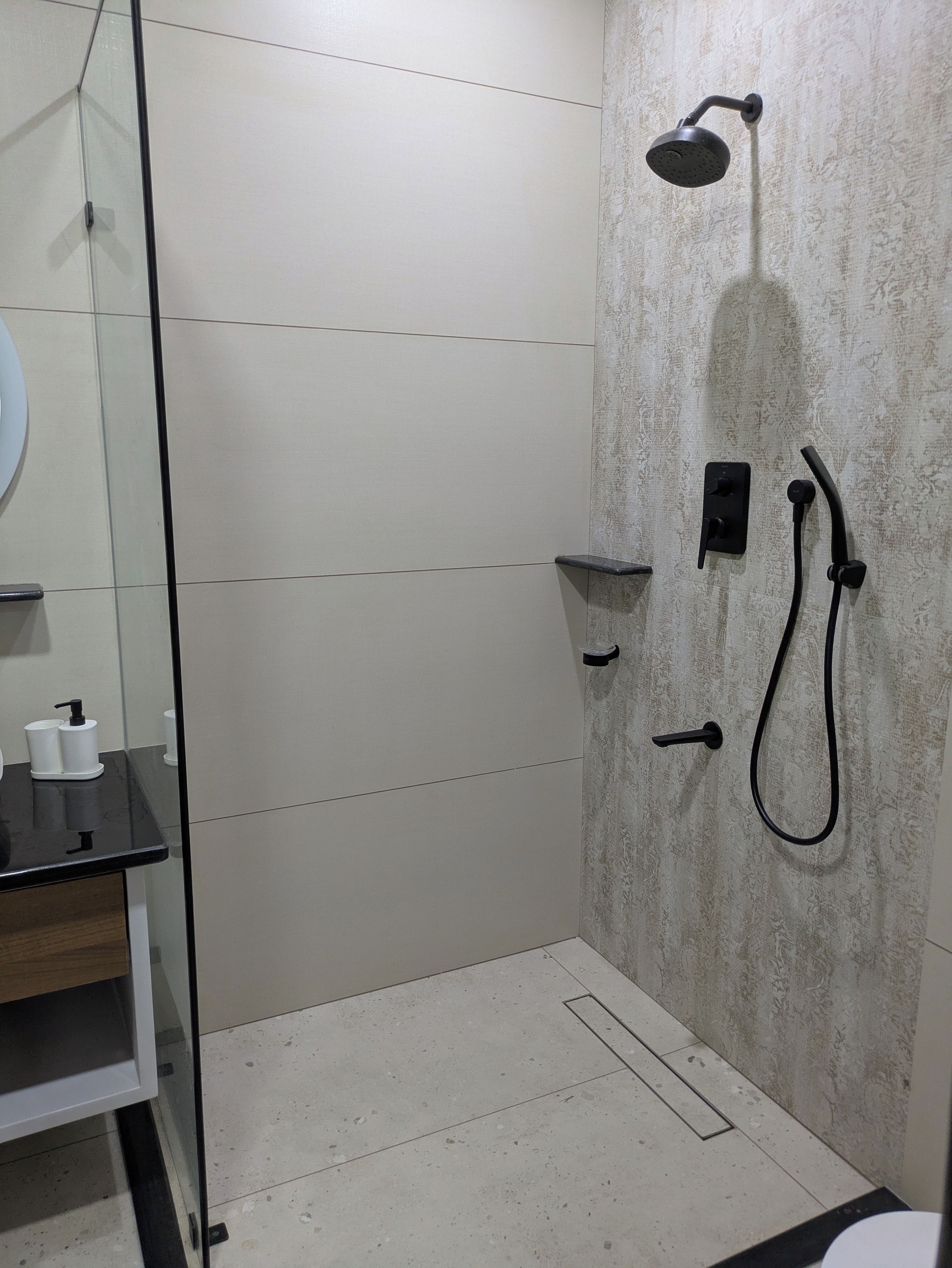 Shower, hair dryer (on request), towels, toilet paper