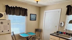 Private kitchen - Comfy and cozy East Nashville cottage! (Nashville)