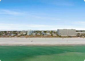 A coastal hotel with beachfront access, multiple buildings, and a sandy beach. - Coastal Cabana• Private Pool• Ocean View• Near 30A (Panama City Beach)