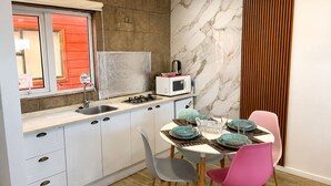 Maison Familiale, vue cour intérieure | Cuisine privée