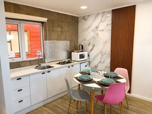Casa família, vista para o pátio | Cozinha privada