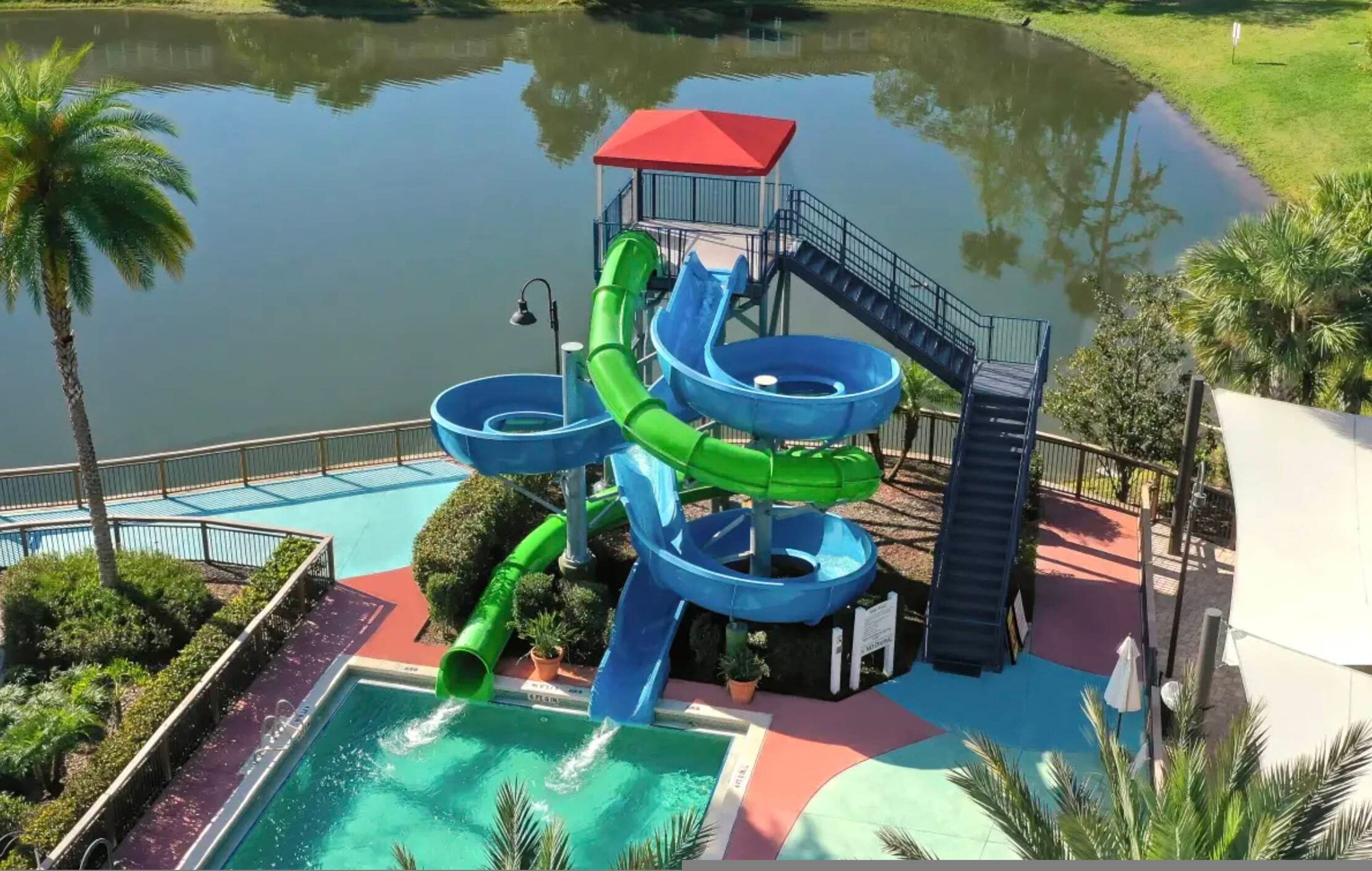 A water park with multiple slides and a pool area.