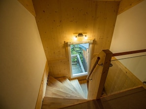 A wooden staircase with a window at the top leading to an outdoor area. - Cabin in Annaberg With Swimming Pool (Annaberg-Lungoetz)