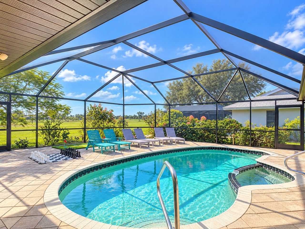 294 rotonda cover Sunlit Tropical Pool Lanai with Elegant Screen Frame