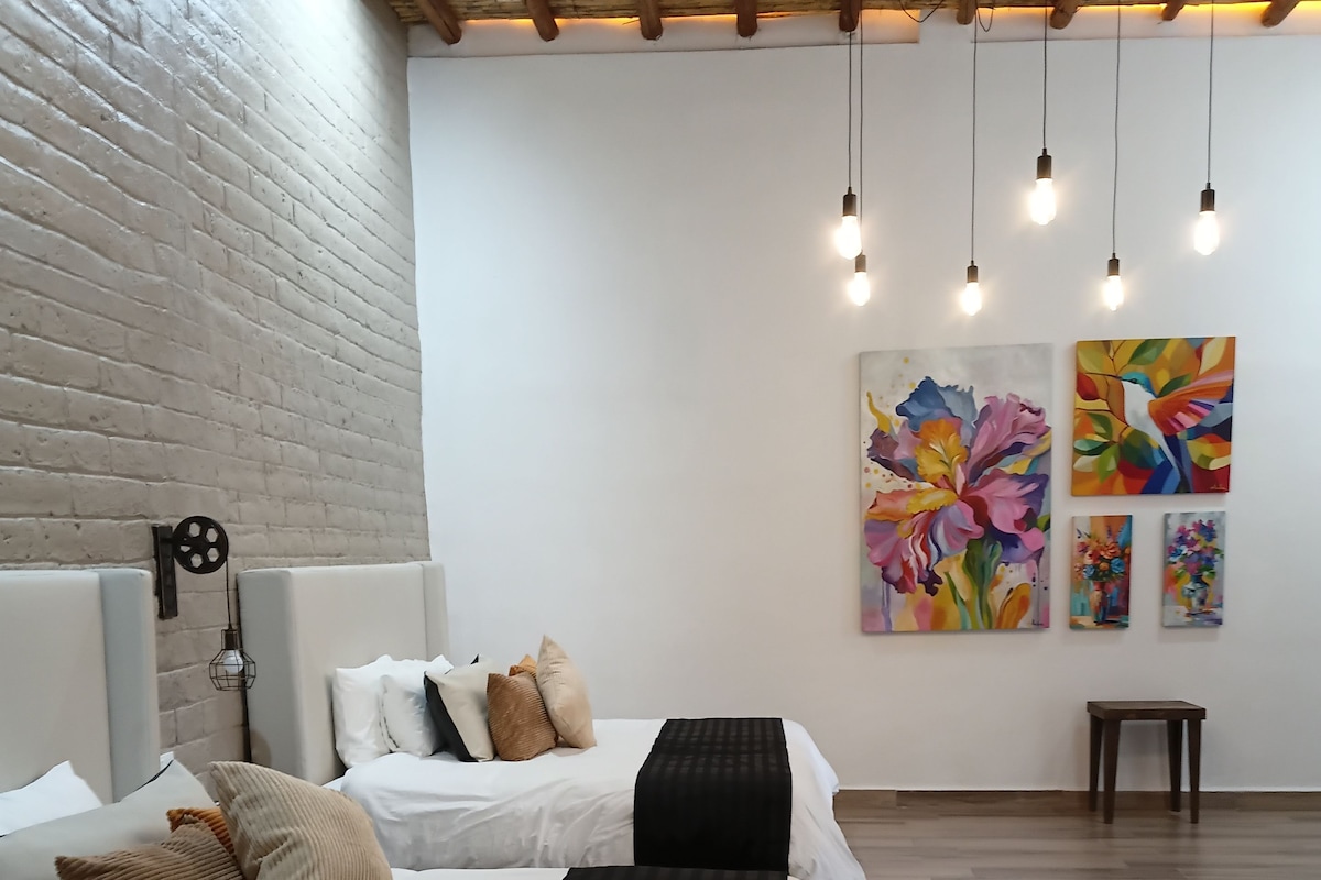 Suite Deluxe | Tabla de planchar con plancha y wifi gratis