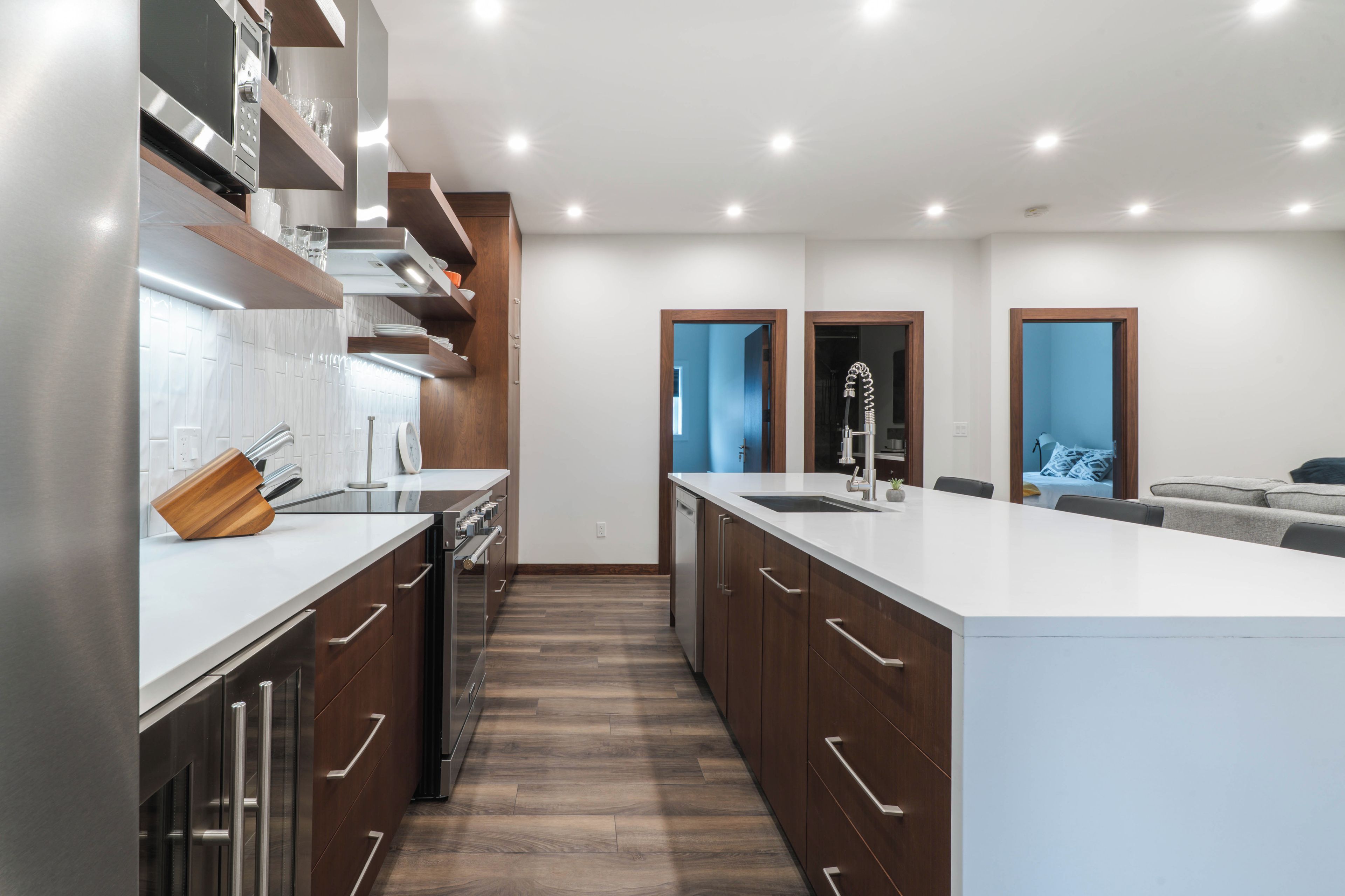 Deluxe Condo | Private kitchen | Full-sized fridge, microwave, oven, stovetop