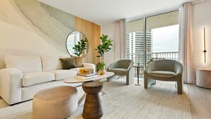 A modern living room with a sofa, two armchairs, a coffee table, and a large window with a view of high-rise buildings. - Relaxing Cloud 9, Central Brickell Location (Miami)