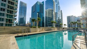 A swimming pool with a view of high-rise buildings in the background. - Relaxing Cloud 9, Central Brickell Location (Miami)