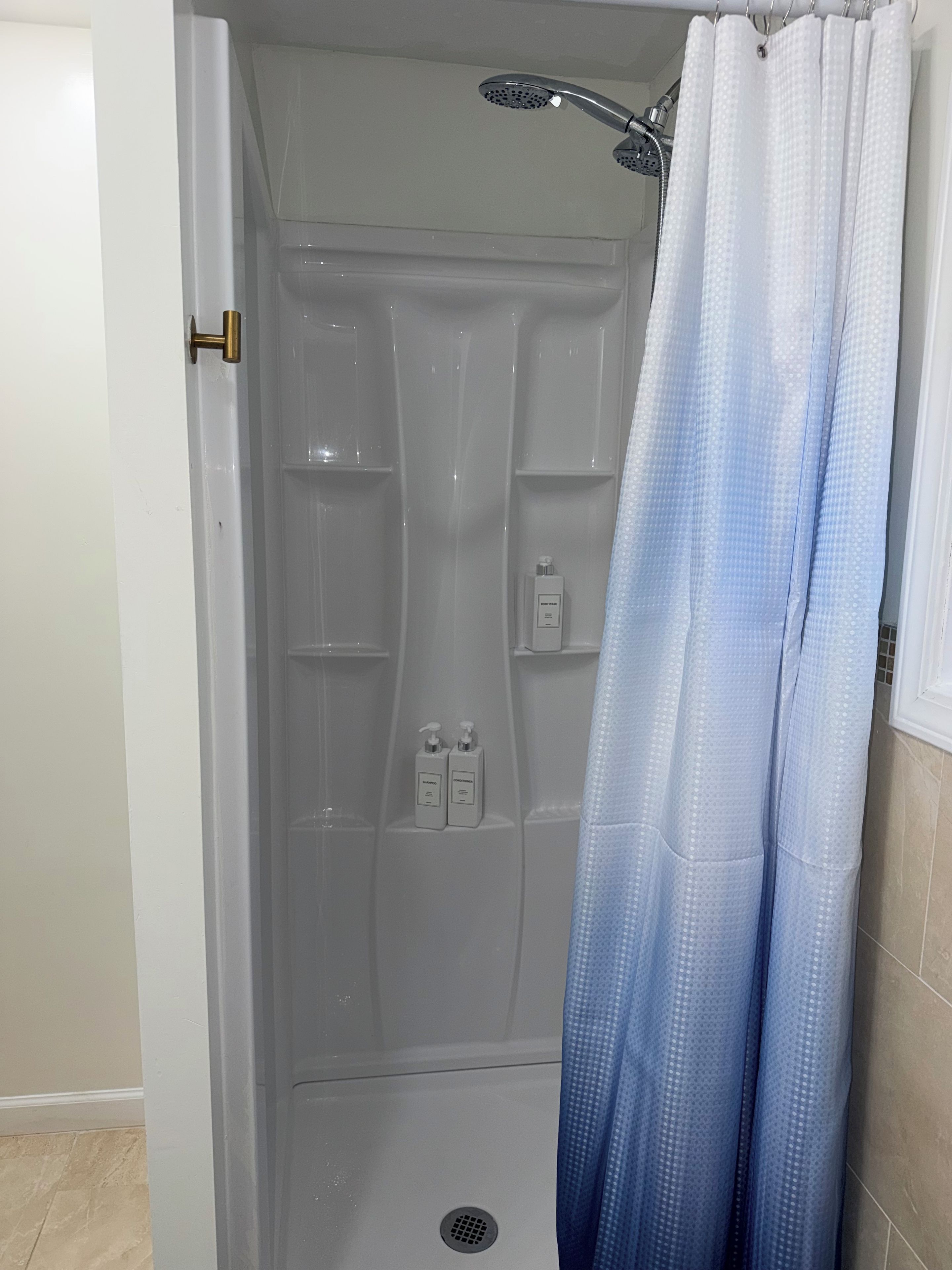 Hair dryer, towels, soap, shampoo