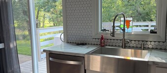 Enjoy Country living in this cozy little house. Yet only minutes from City life.