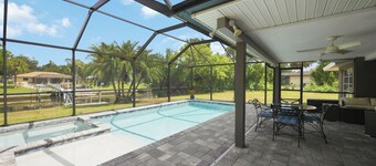 Waterfront 2BR · Heated Saltwater Pool & Spa · Dock + 10K Boat Lift