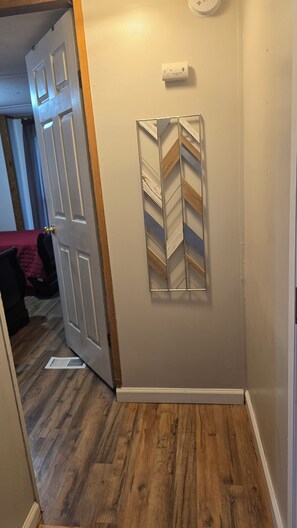 small hallway to the 2nd bedroom and bathroom