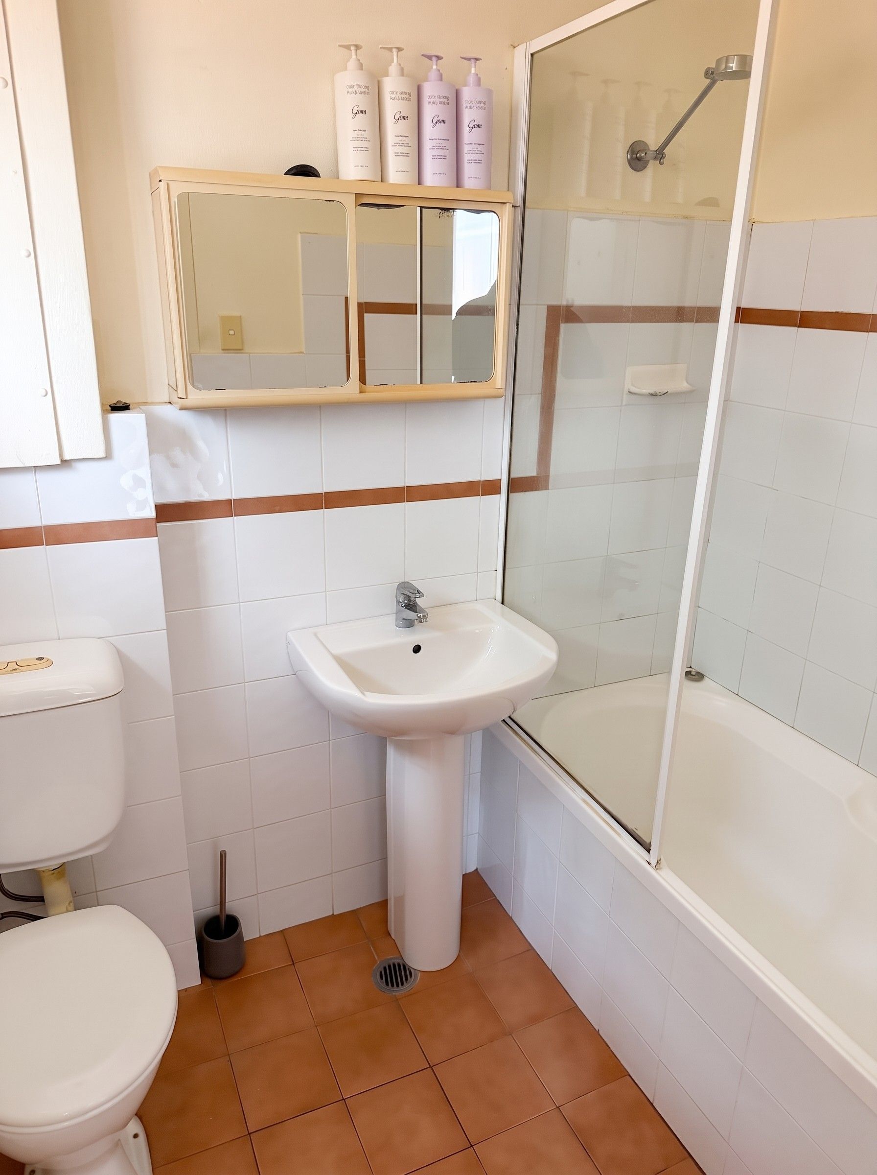 Bathroom with bath and shower