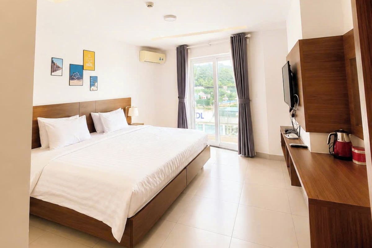 ห้องดีลักซ์ดับเบิล, เตียงควีนไซส์ 1 เตียง, วิวทะเล | โต๊ะทำงาน, Wi-Fi ฟรี