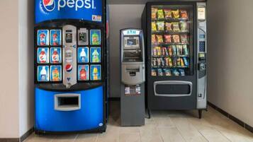 A vending machine area with a Pepsi machine and an ATM.