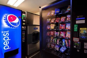 A vending machine with a Pepsi logo and a selection of snacks. - 2 Full Beds | Micfridge (MERRILLVILLE)