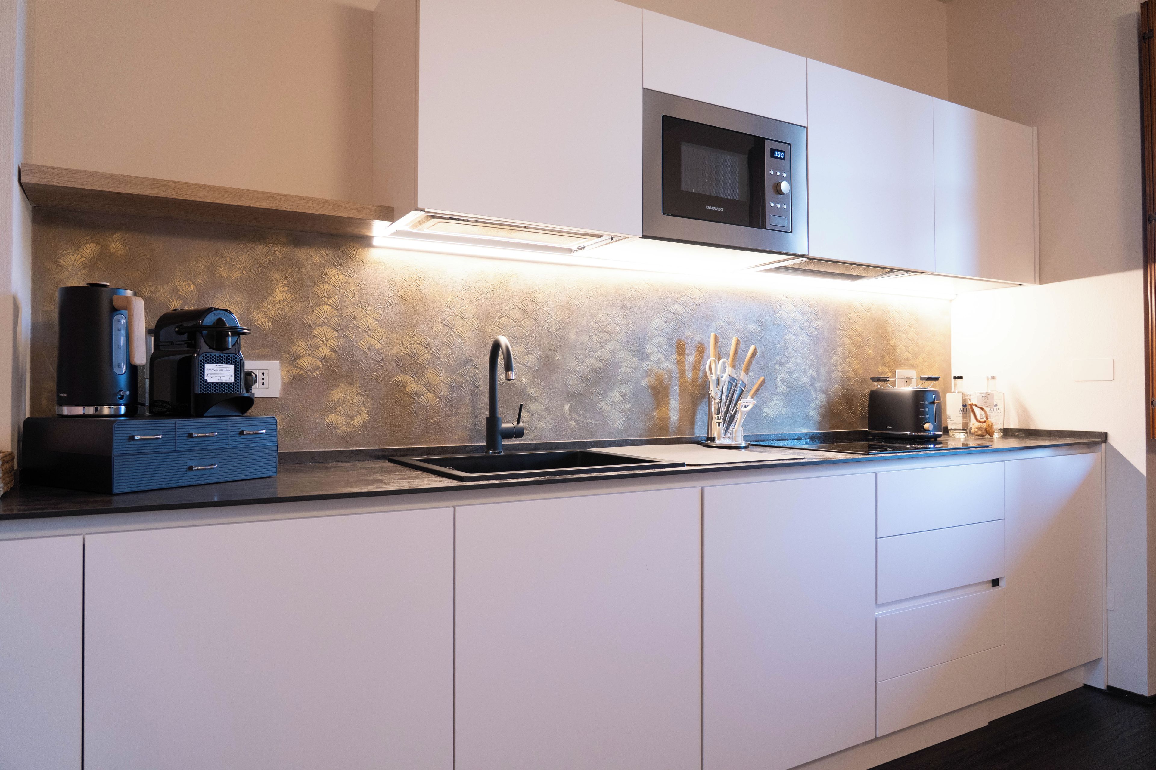 Coffee/tea maker, fridge, microwave, oven