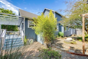 A residential property with a covered patio, a garden with various plants, and a wooden fence. - 2 Mi to Ocean & Coastal Trails! McKinleyville Home (McKinleyville)