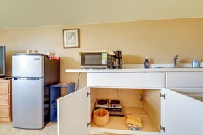 A compact kitchenette with a refrigerator, microwave, coffee maker, and a small sink. - Couple’s Retreat 4 Mi to Dtwn! Gateway to Glacier (Columbia Falls)