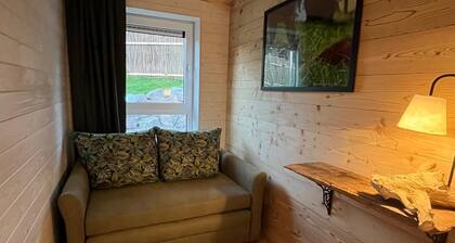 MINI-CHALET "HEARTBEAT OF ALPACAS" — featuring a hot tub and a hobbit sauna