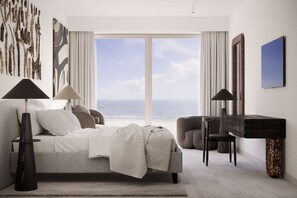 Ein modernes Schlafzimmer mit großem Fenster, einem Bett, einem Sessel und einem Schreibtisch.