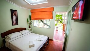 Family Duplex, Garden View | Laptop workspace, blackout drapes, iron/ironing board (on request)