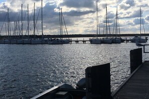 A marina with multiple sailboats docked. - Holiday apartment in Juliusruh with parking (Juliusruh)