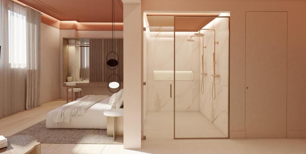 Un dormitorio moderno con cama, mesita de noche y un vestidor con ducha.