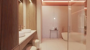 A modern bathroom with a large bathtub, a vanity with two sinks, and a small table with toiletries.
