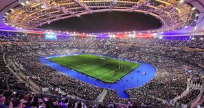 A large stadium with multiple tiers of seating and a central field. - Charming 1‑Bedroom Apartment 500 m from Paris – RER B 2 min – Cité Universitaire (Gentilly)