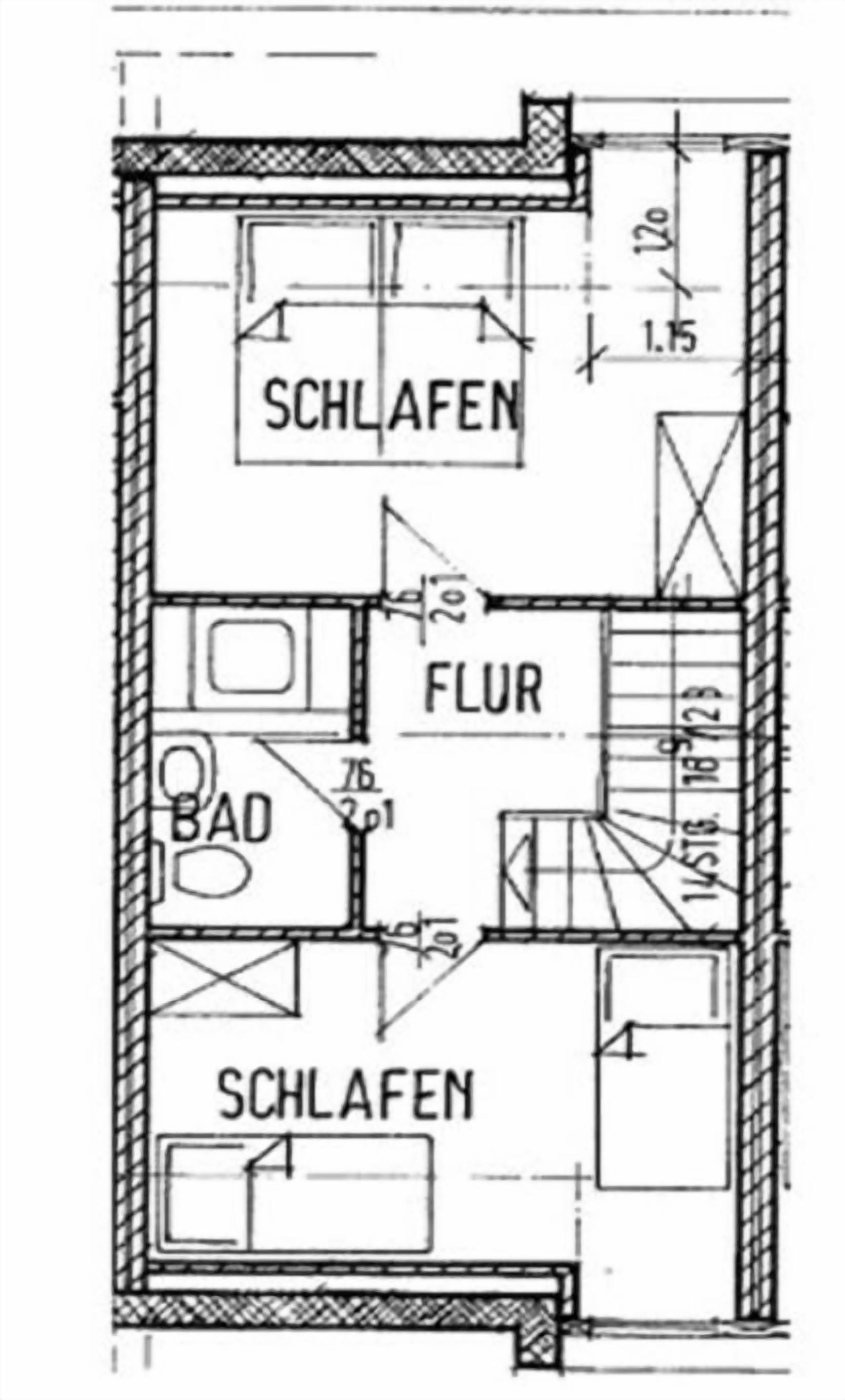 A floor plan with two bedrooms, a bathroom, a kitchen, and a living area.