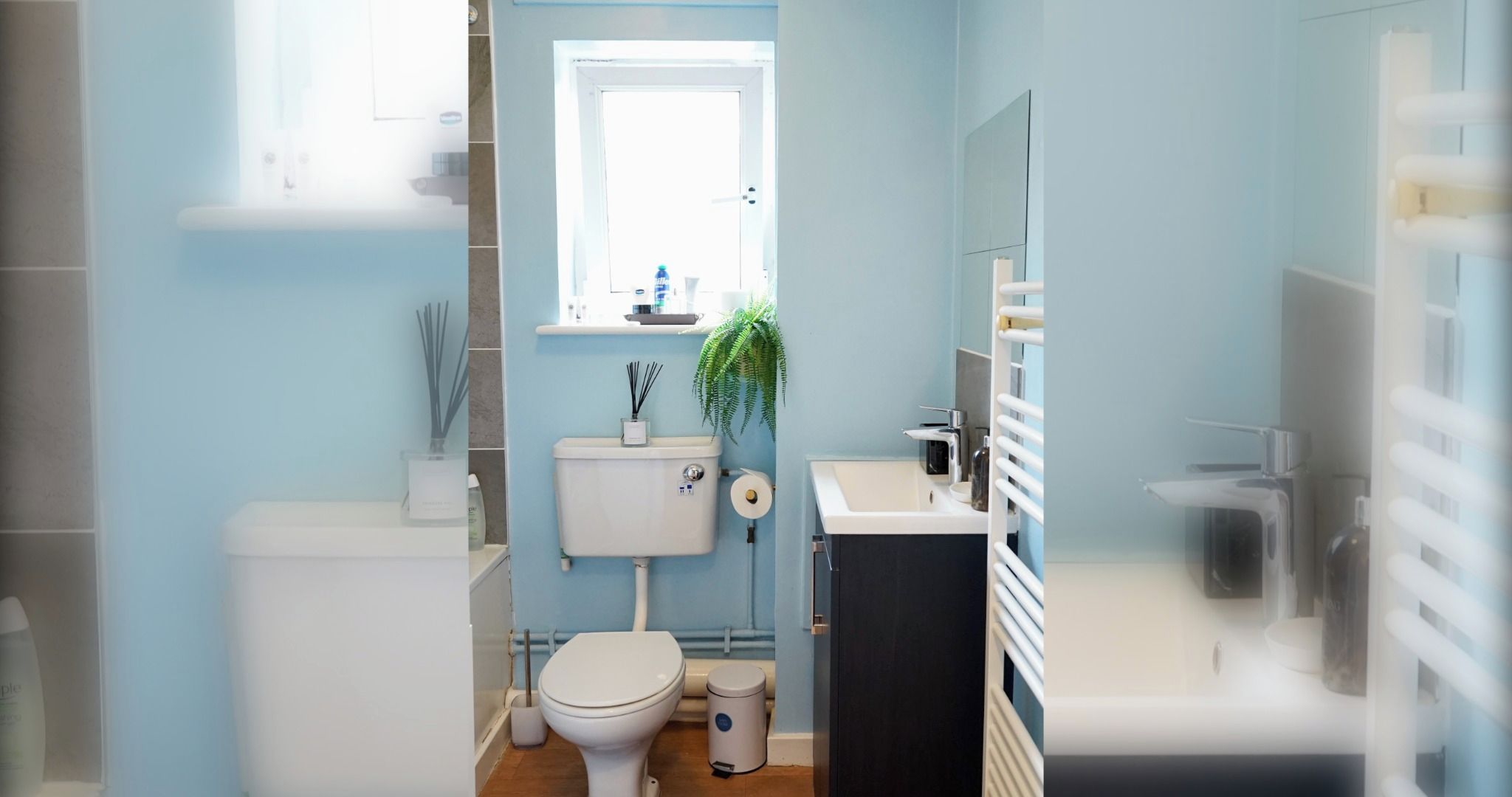 Une petite salle de bain comprenant des toilettes, un bidet, un lavabo et une petite fenêtre.