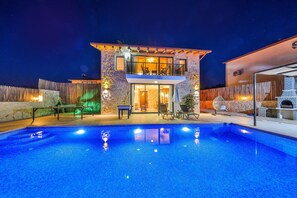 A two-story house with a swimming pool in the foreground. - Serene 1-bedroom Villa With Private Pool in Gelemiş (Kaş)