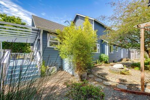 A residential property with a covered patio, a garden with various plants, and a wooden fence. - 2 Mi to Ocean & Coastal Trails! Mckinleyville Home (McKinleyville)