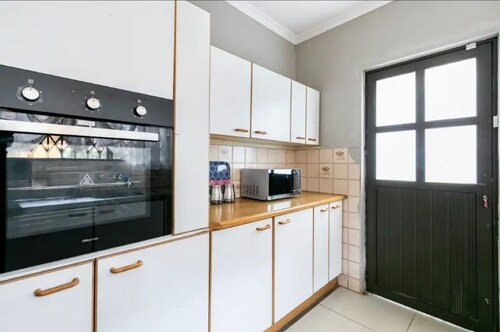 Self-check in property with a huge family yard in Alberton surbub area